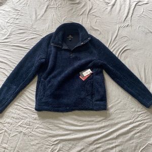 This is a blue fluffy pullover